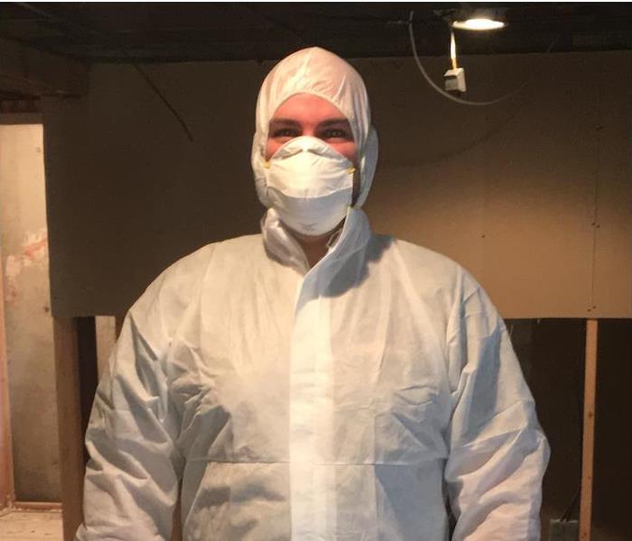SERVPRO technician wearing a PPE suit