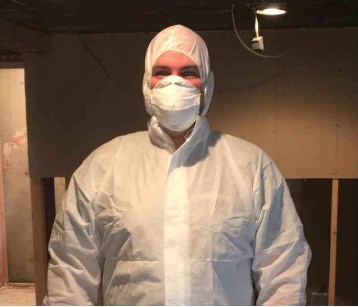 SERVPRO technician wearing a PPE suit